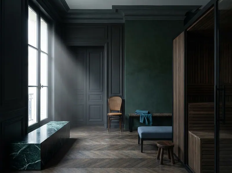 Bespoke thermal suite with glazed sauna cabin, deep forest green honed marble and dark oak parquet — infrared sauna benefits designed as architecture by Beverly Hills Luxury Interiors