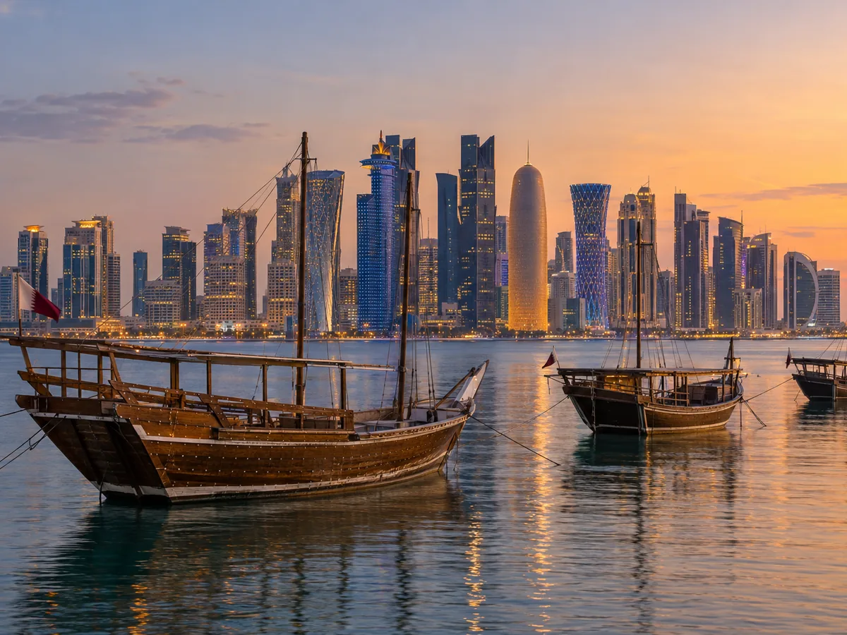 Traditional dhow boats on Doha Bay before the West Bay skyline, Qatar